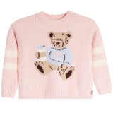 A light pink fuzzy knit sweater with a teddy bear motif on the chest and cream stripes on the sleeves, shown against a plain white background.