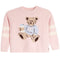 A light pink fuzzy knit sweater with a teddy bear motif on the chest and cream stripes on the sleeves, shown against a plain white background.