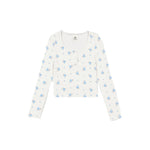 An off-white long-sleeve cropped henley top with a delicate blue and light blue floral print, displayed flat against a solid white background.