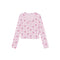 A light pink long-sleeve cropped henley top with a small pink and purple floral pattern, displayed flat against a solid white background.