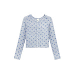 A light gray long-sleeve cardigan with a blue floral pattern, featuring a button-up front and a small white brand label at the collar.