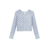 A light gray long-sleeve cardigan with a blue floral pattern, featuring a button-up front and a small white brand label at the collar.