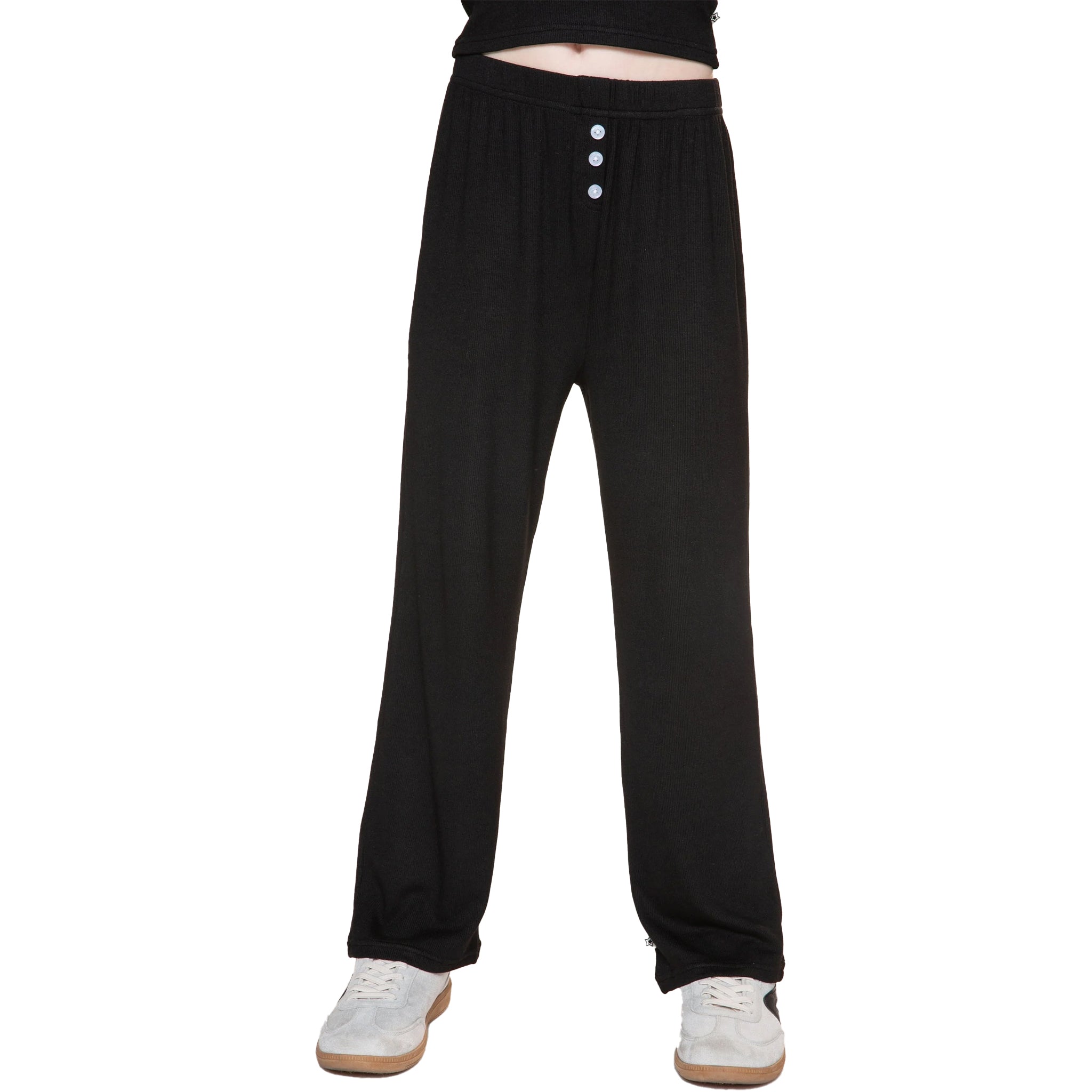 Black wide-leg lounge pants with a three-button placket, shown on a model from the waist down wearing white sneakers against a white background.