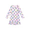 A long-sleeve baby dress with a ruffled hem, featuring an all-over print of colorful ring pops on a pastel pink and iridescent background.