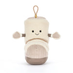 A plush toy shaped like a boot or shoe, made from cream-colored faux fur with a beige corduroy-textured lower section, brown accents on the soles and arm cuffs, and a small tan hanging loop at the top. It has a simple embroidered smiley face.