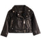 A black faux leather moto jacket with silver-tone hardware, displayed flat against a solid white background. The jacket features a pointed collar, asymmetrical zipper closure, and zippered pockets.