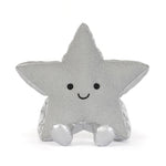 A silver glittery star-shaped plush toy with a cute embroidered smiley face, sitting against a plain white background.