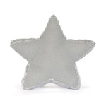 A five-pointed star-shaped decorative pillow in a textured silver fabric, photographed against a seamless white background.