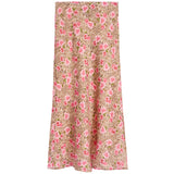 A long skirt with a pink rose and leopard print pattern on a beige background, shown flat against a white background.
