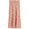 A long skirt with a pink rose and leopard print pattern on a beige background, shown flat against a white background.