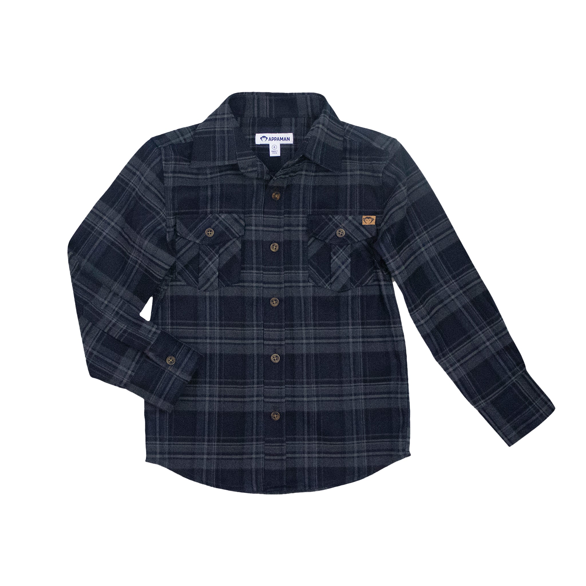 A Columbia long-sleeve button-up flannel shirt in navy blue with a gray and black plaid pattern, featuring two chest pockets with button flaps and a small brown brand patch on the left chest.