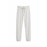 Light heather gray sweatpants with an elastic waistband and a cream-colored drawstring, shown flat against a white background.