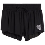 Black double-layered ruffled shorts with an elastic drawstring waist and a white heart pattern on the lower left leg, shown against a plain white background.