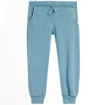 Light blue heathered sweatpants with a drawstring waist, side pockets, and decorative white stitching on the pocket edges, shown against a plain white background.