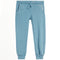 Light blue heathered sweatpants with a drawstring waist, side pockets, and decorative white stitching on the pocket edges, shown against a plain white background.