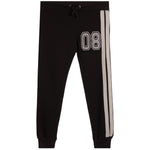 Black sweatpants with a white and gray '08' number print on the left thigh and double side stripes on the right leg, shown against a plain white background.