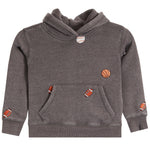 A dark gray heathered hoodie sweatshirt for kids, featuring small embroidered sports ball patches (basketball, football, baseball) on the chest and sleeves, displayed on a clean white background.