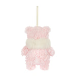 A small pink plush teddy bear ornament with a fluffy cream-colored scarf and a hanging loop at the top, shown against a plain white background.