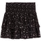 A black tiered ruffle mini skirt with a small white floral print, featuring a smocked elastic waistband.