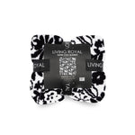 Black and white patterned blanket with 'Living Royal' branding on a white background