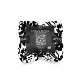 Black and white patterned blanket with 'Living Royal' branding on a white background