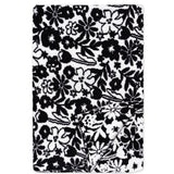 A rectangular black and white floral patterned blanket or throw, shown flat against a white background with one corner folded over.