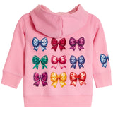 A pink long-sleeve hooded sweatshirt for a child, featuring a graphic print of nine colorful sequined bows on the back and a matching bow design on the sleeve.