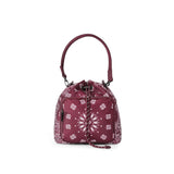 A burgundy drawstring bucket bag with a white floral bandana print, featuring a top handle and a front zippered pocket, shown on a plain white background.