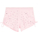 Pink shorts with decorative rhinestone elements on a white background
