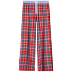 Red plaid pajama pants with a blue and white striped waistband, featuring a pink and green tartan pattern.