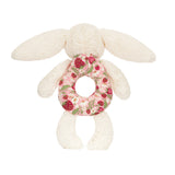 Plush blossom creme bunny berry ring rattle on a white background