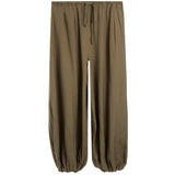 A pair of loose, wide-leg pants in a muted olive-brown or khaki color, featuring an elastic waistband with a drawstring and gathered elastic cuffs at the ankles, shown against a plain white background.