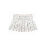 White eyelet tennis skirt with a pleated elastic waistband, shown flat on a white background.