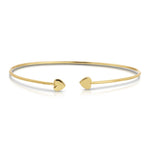 Gold bracelet with heart-shaped ends on a white background
