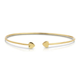 Gold bracelet with heart-shaped ends on a white background