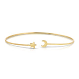 A thin gold bangle bracelet with an open end featuring a small star charm and the other end featuring a small crescent moon charm, displayed on a clean white background.