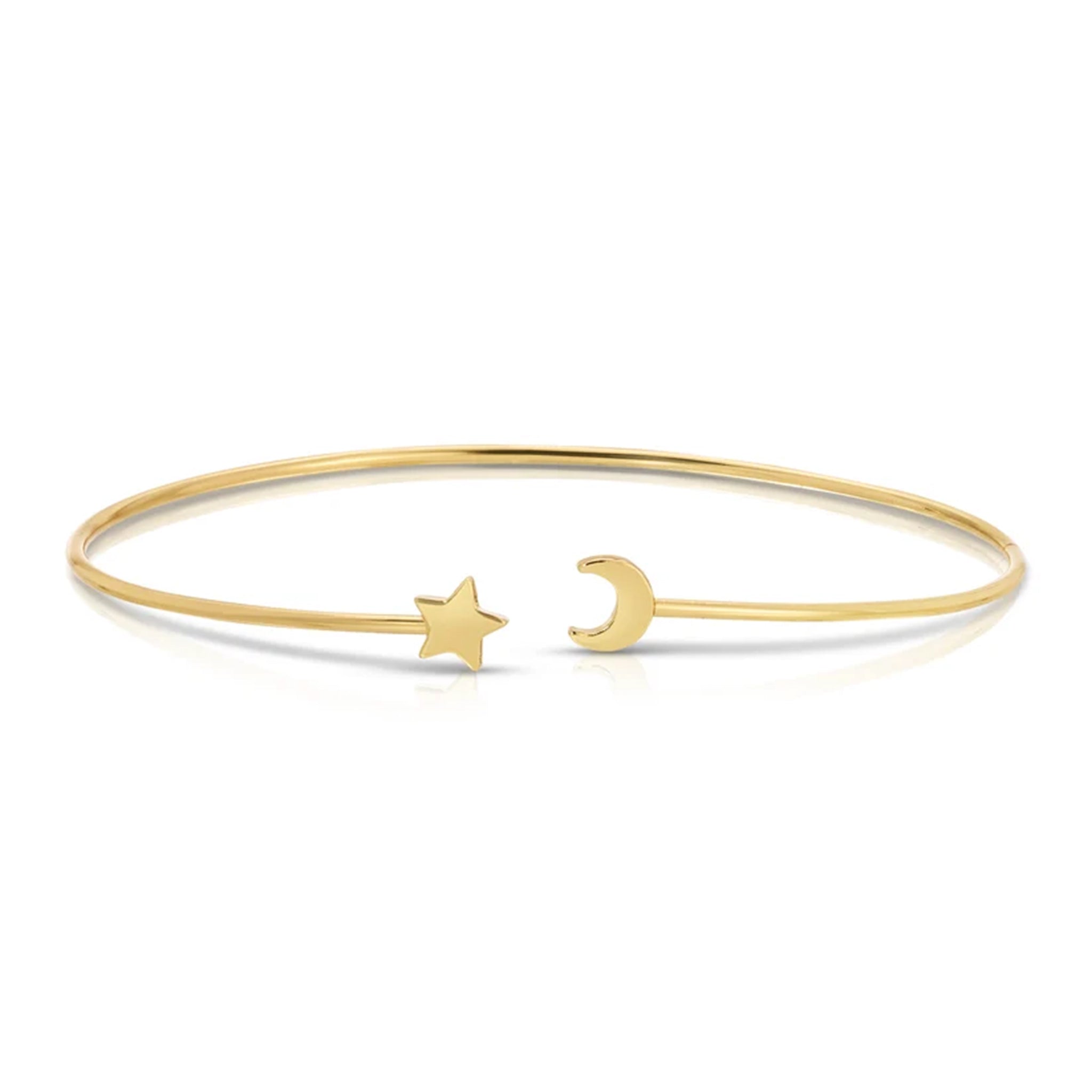 A thin gold bangle bracelet with an open end featuring a small star charm and the other end featuring a small crescent moon charm, displayed on a clean white background.