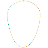 A delicate gold chain necklace with small, evenly spaced colorful beads in pink, green, yellow, and light blue, displayed on a clean white background.