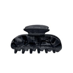 A glossy black hair claw clip shown against a plain white background.