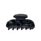 A glossy black hair claw clip shown against a plain white background.