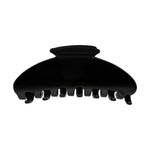 A glossy black hair claw clip shown from the side against a plain white background.