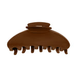 A single brown hair claw clip shown against a plain white background.