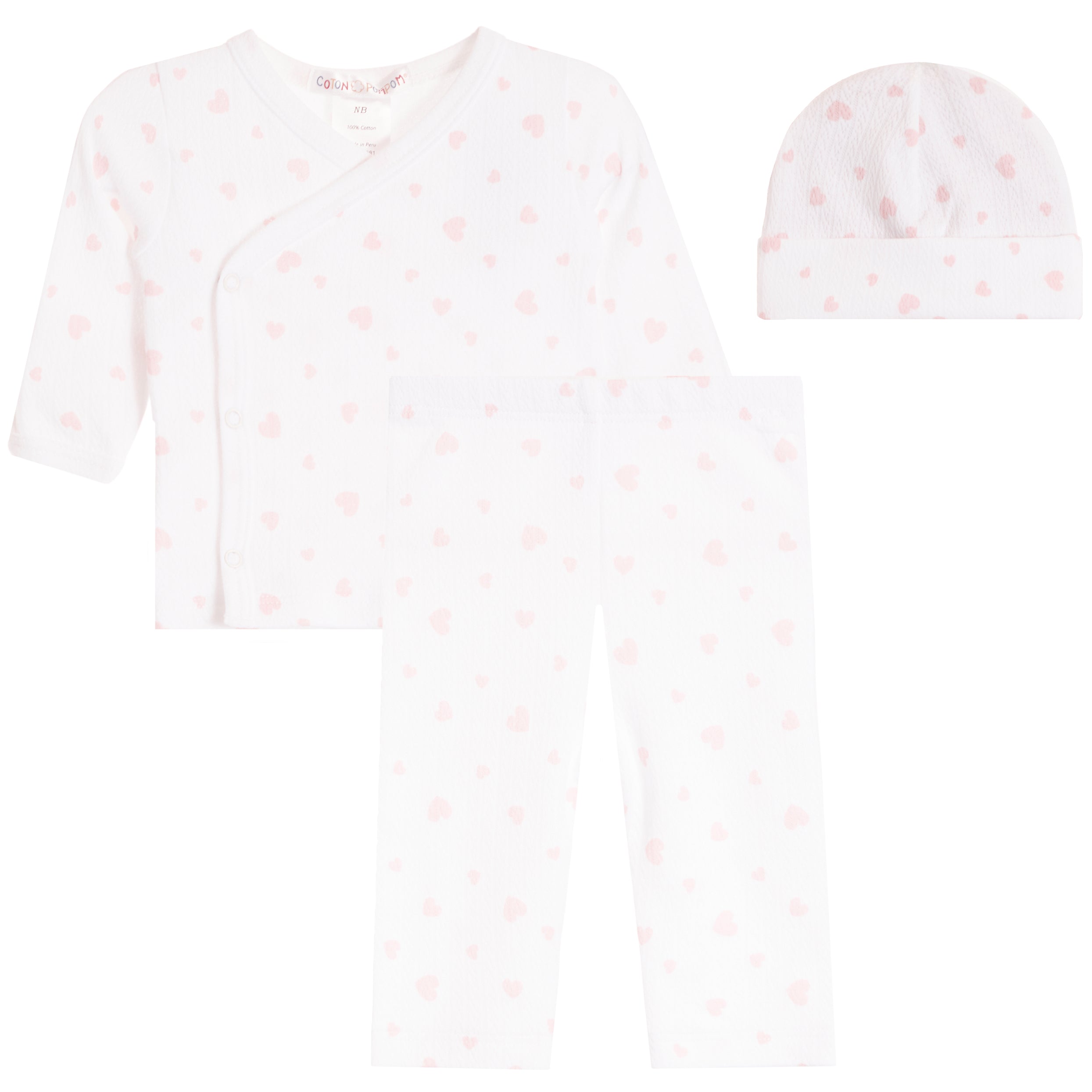 A three-piece baby clothing set including a long-sleeve wrap bodysuit, leggings, and a beanie hat, all in white with a light pink heart pattern, displayed on a solid white background.