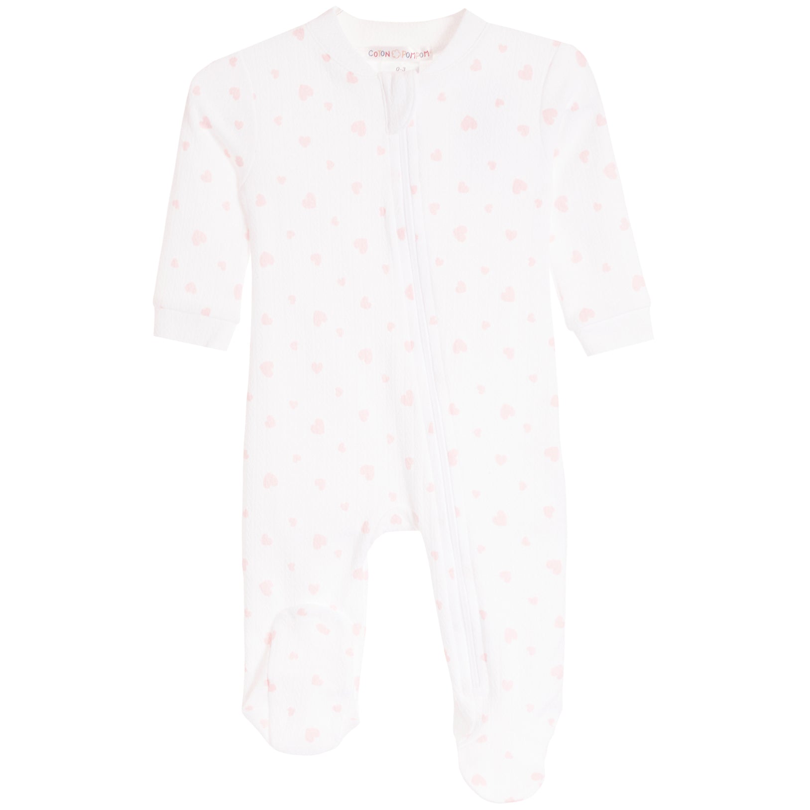 A white long-sleeve baby footed sleeper with a light pink hearts pattern and a front zipper, shown against a plain white background.