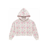 A cropped hooded sweatshirt with a pink and gray bow and floral print on a cream background, shown flat against a white background.
