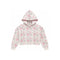 A cropped hooded sweatshirt with a pink and gray bow and floral print on a cream background, shown flat against a white background.