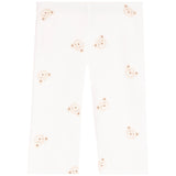 White leggings with a repeating pattern of small teddy bear faces in light beige and pink, shown flat against a white background.