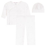 A three-piece baby clothing set including a long-sleeve wrap shirt, pants, and a beanie hat, all in white with a subtle light blue star pattern, displayed on a solid white background.