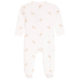 A long-sleeve baby footed sleeper in off-white, featuring a delicate all-over print of small teddy bear faces.