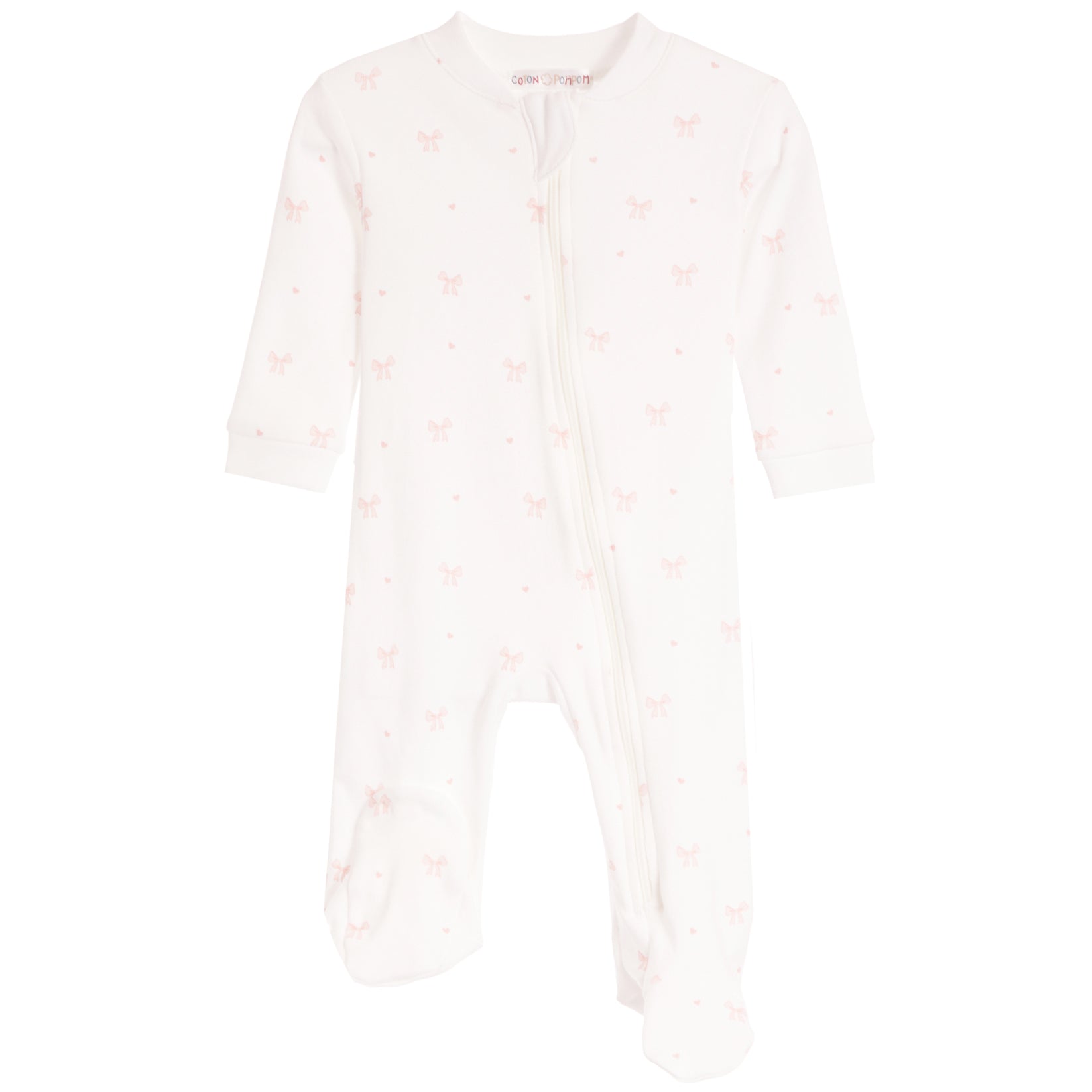 A baby long-sleeve footed sleeper in white with a delicate pink bow and heart pattern, shown flat on a white background.